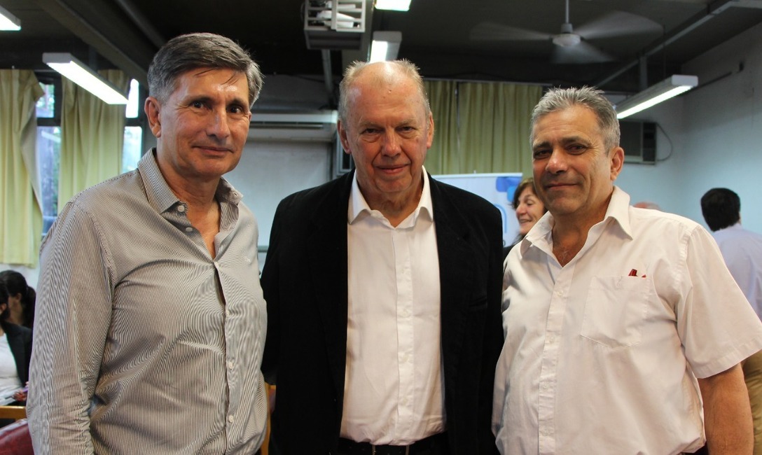 Schmalko junto al presidente del INYM, Juan José Szychowski y Nelson Dalcomo, director representante por la Producción.